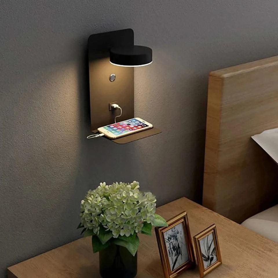 led lamp on wall - Futura's Studio charging phone